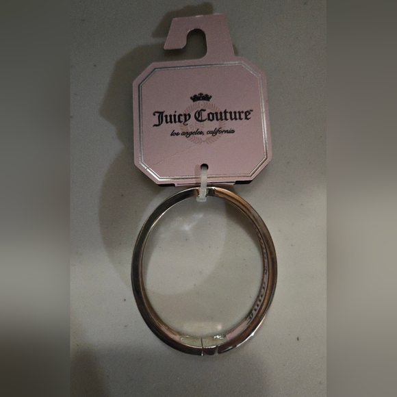 Juicy Couture Silver Tone Bangle with Pink Interior Trim - Picture 4 of 5